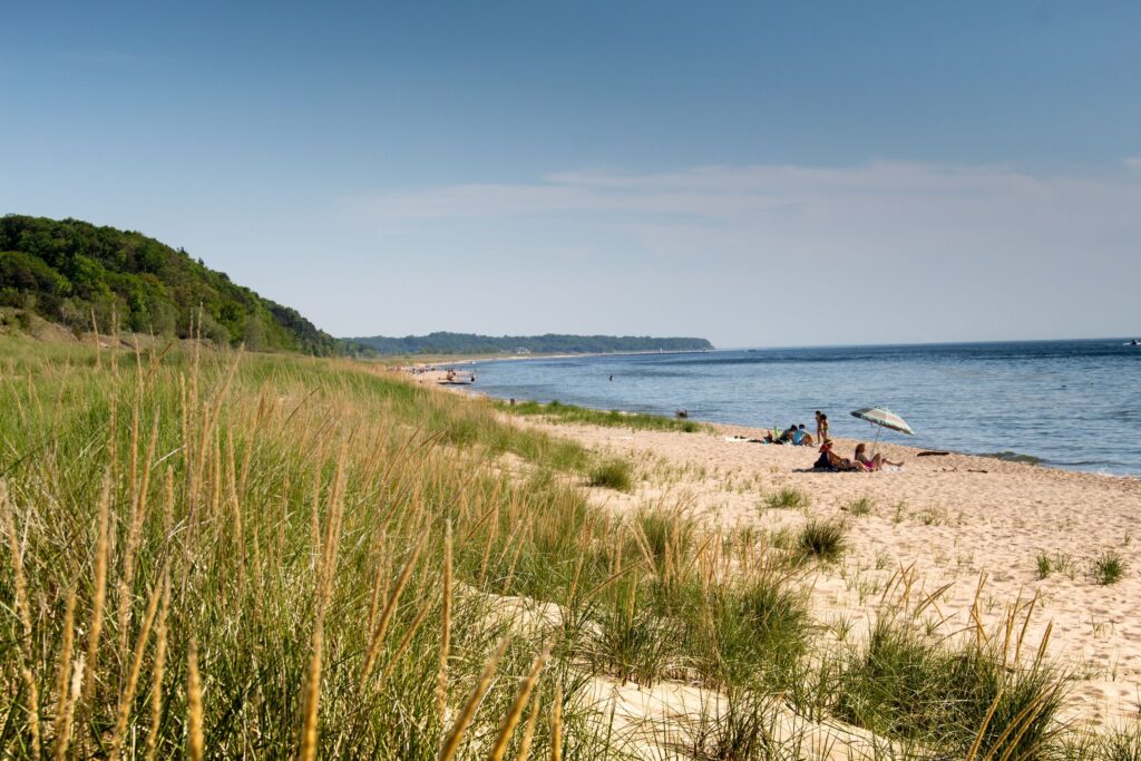 People enjoying a beach in Michigan