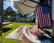 RV camper with an American flag