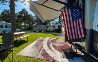 RV camper with an American flag