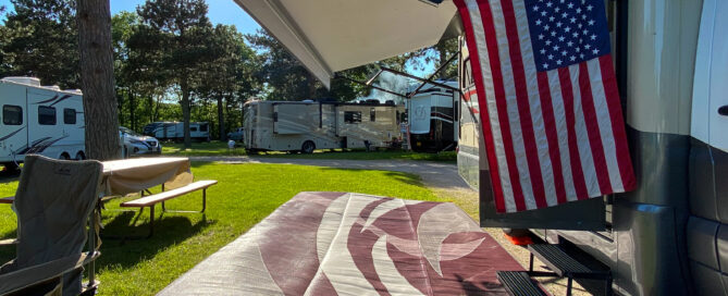 RV camper with an American flag