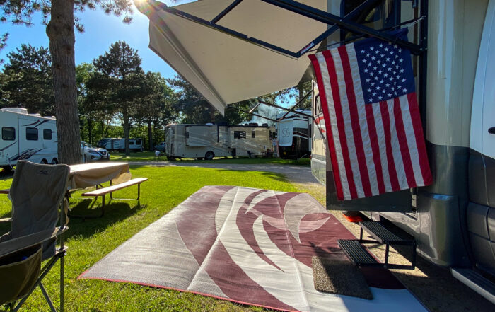 RV camper with an American flag