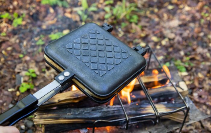 Cooking with a pie iron at the campsite