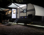 night RV campsite travel trailer
