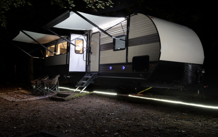 night RV campsite travel trailer